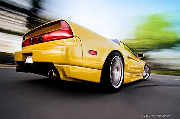 Cars in motion by RhPhotography