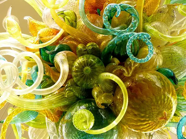 more swirls of Dale Chihuly glass chandeliers by...