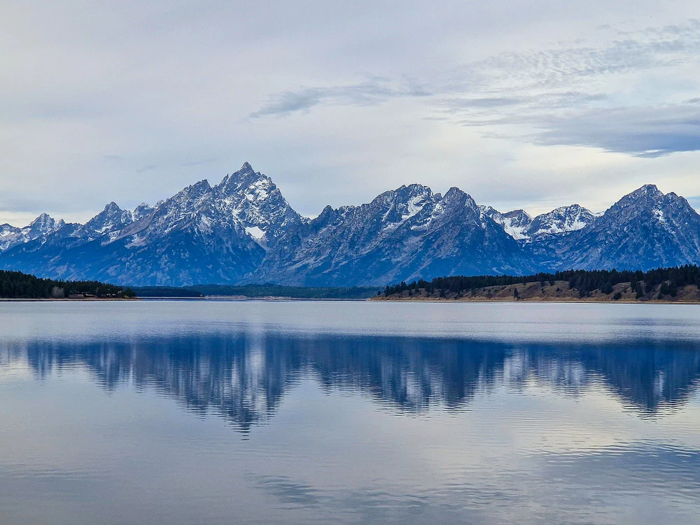 Serene Reflections of the Grand Tetons at Dawn