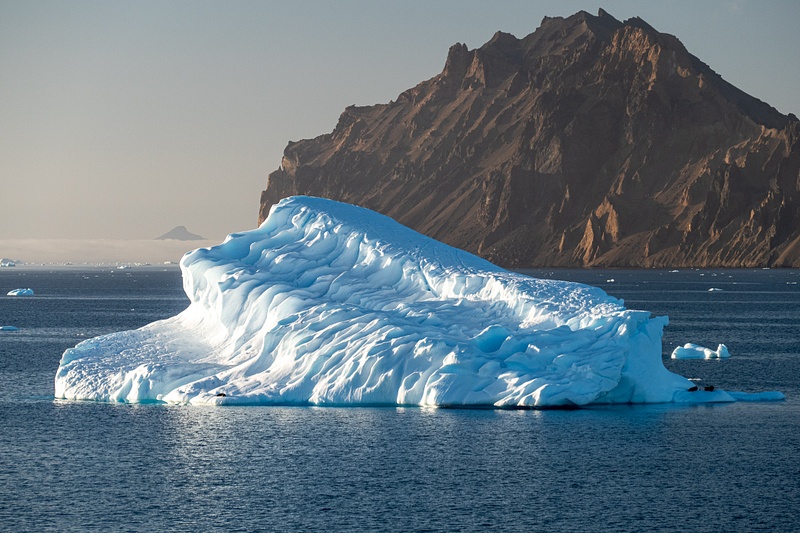 9 Iceberg with three Antarctic fur seals (bottom left and right)