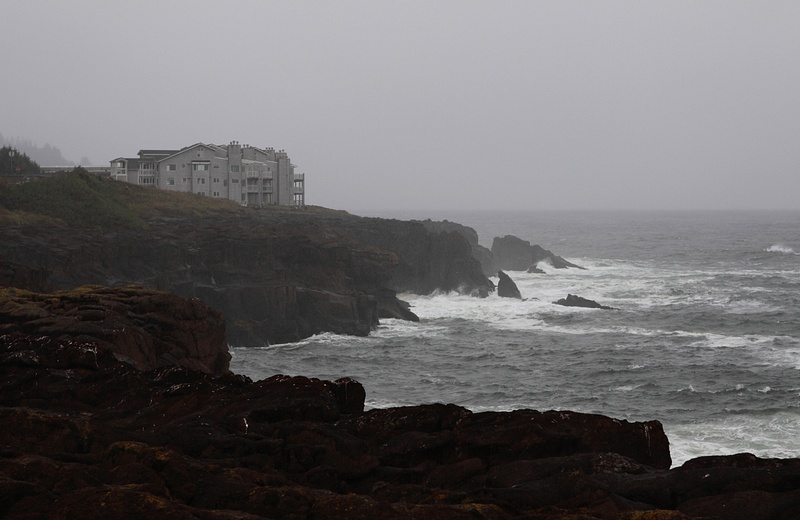 misty hotel on the rocks
