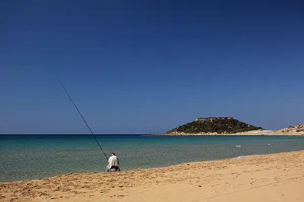 Fishing in the morning, Golden Beach, Northern cyprus by...