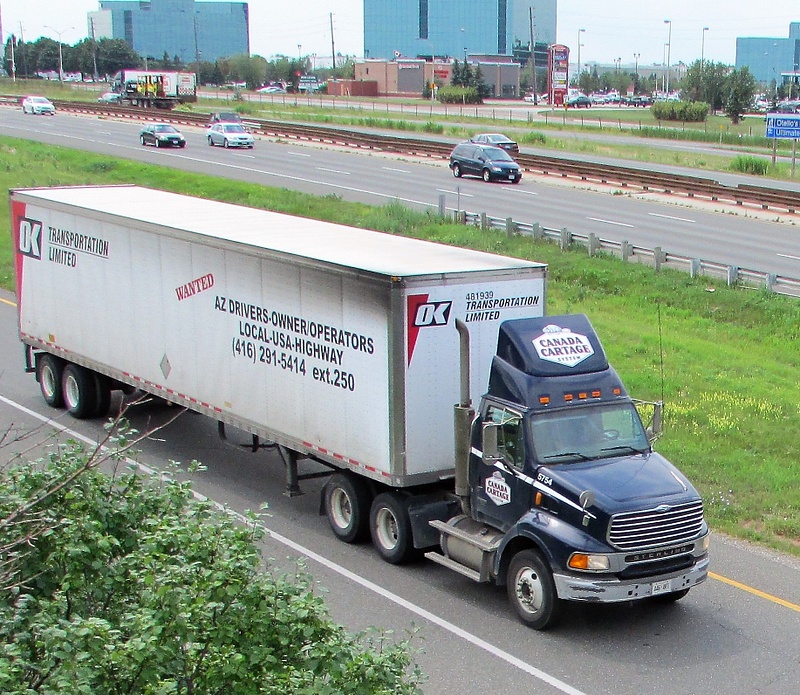 Sterling with OK Transportation trailer.