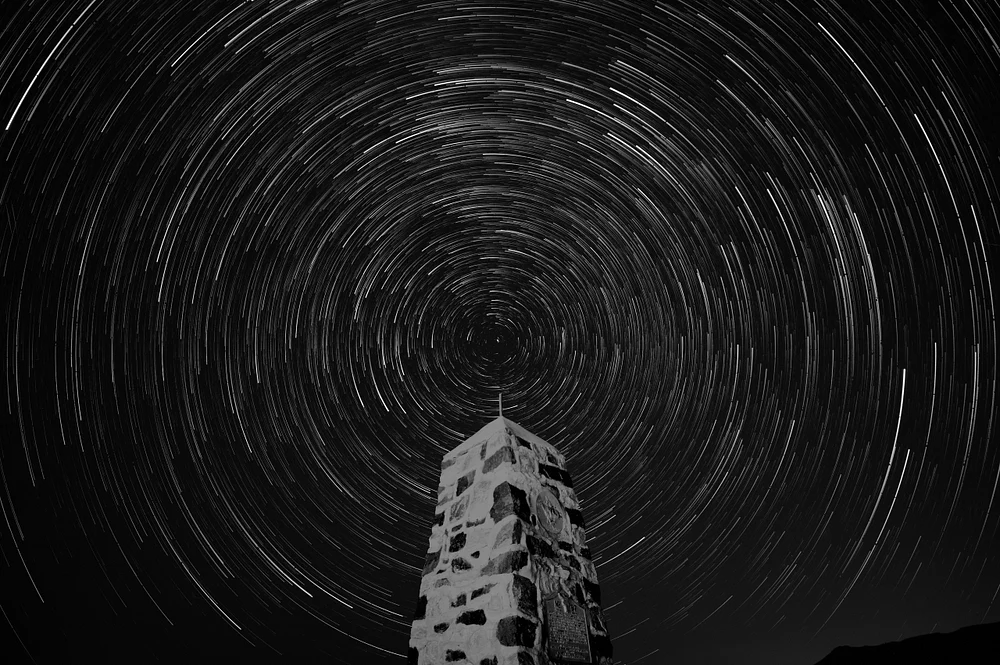 Celestial Whirls Above Historic Monument