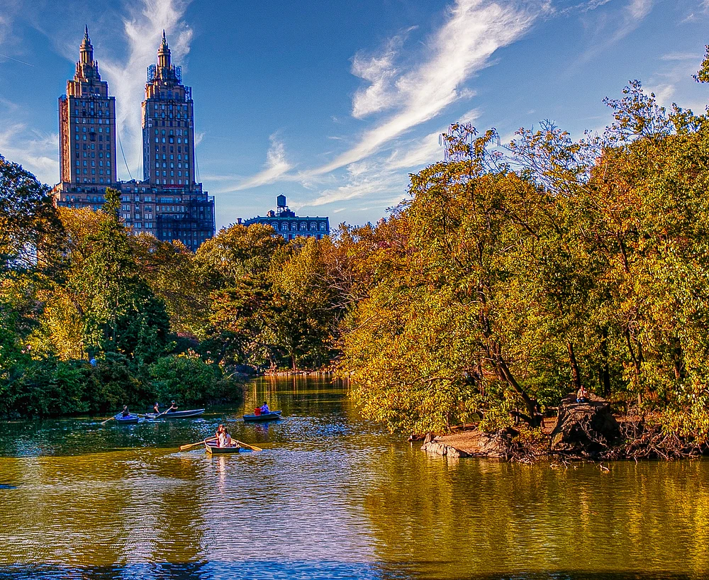 Picturesque View of The Lake in Central Park with Cityscape