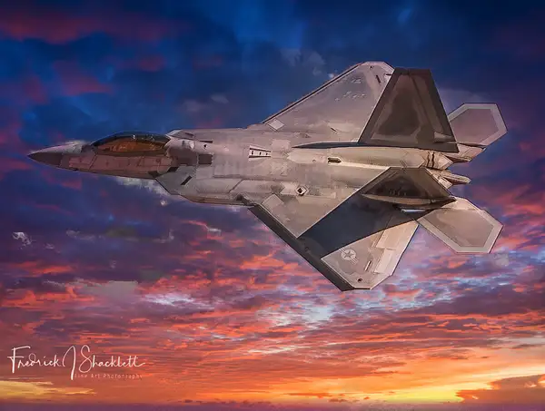 F-22 Sunset Flyby by PhotoShacklett