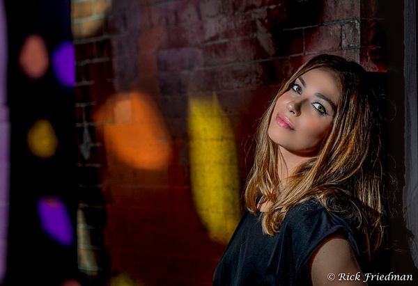 Model with colors projected on old brick wall in Boston by Rick Friedman - Models - Rick Friedman Photography 