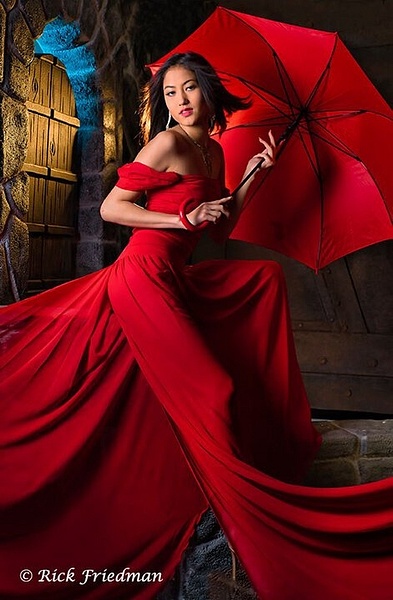 AmerAsian model in red dress with red umbrella  by Rick Friedman - Models - Rick Friedman Photography 