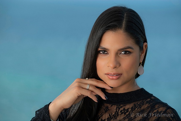Model with long black hair with the ocean  in the background by Rick Friedman - Models - Rick Friedman Photography 