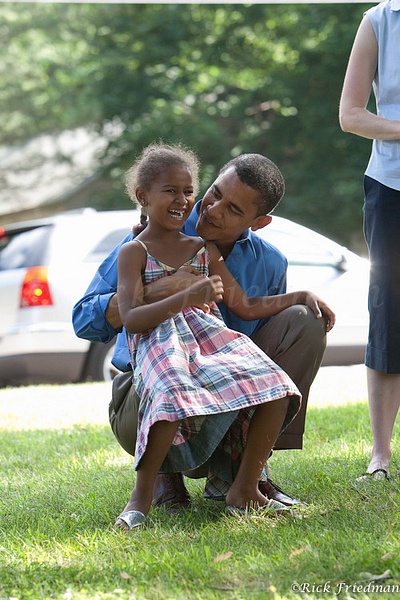 President Barack Obama with his young daughter Sasha by Rick Friedman - Rick Friedman Photography