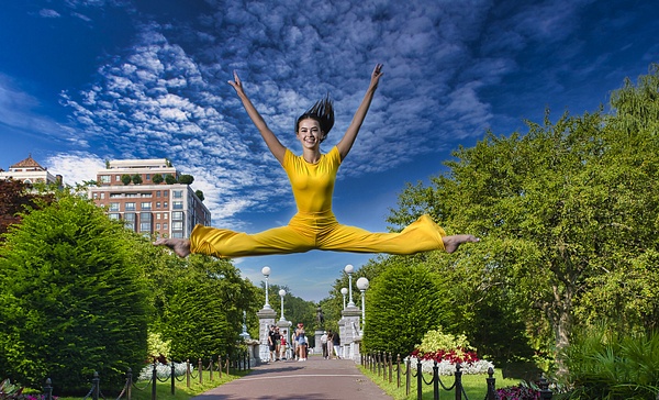 Model in yellow jumpsuit leaping above the  Boston Public Garden by Rick Friedman - Rick & Rick Photo Workshops