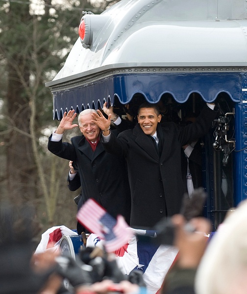 President Barack Obama &amp; V P Joe Biden  waving from the back of a train on their  way to their inauguration  by  Rick Frie - Rick Friedman Photography 