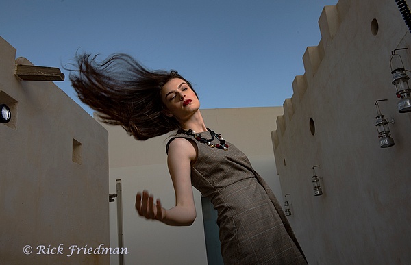 Brunette model with flowing hair in old city,  Sharjah, UAE - Rick Friedman Photography