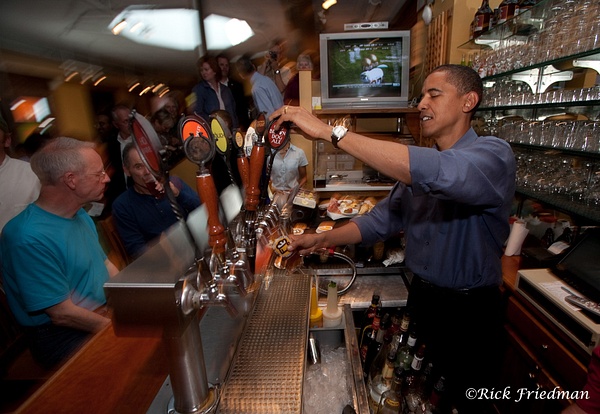 President Barack Obama behind the bar pouring  beer in Portsmouth,  NH  by Rick Friedman - Rick Friedman Photography