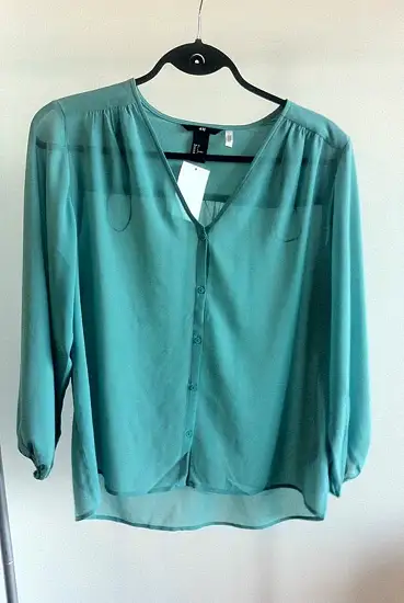 teal blouse by ZincProduction