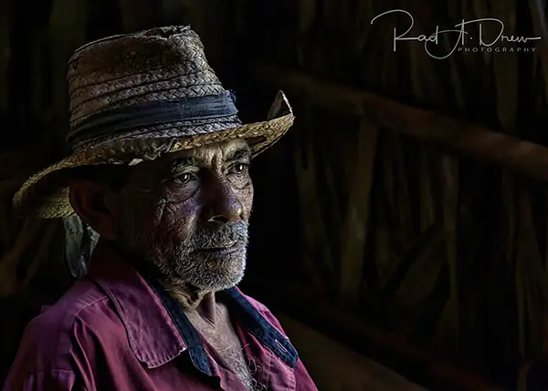 Farmer in Drying Barn Topaz Sig_MailChimp_Larger by Rad...