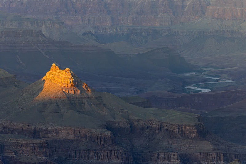 Last Rays Of Sunlight Illuminate A Small Feature Within The Grand Canyon