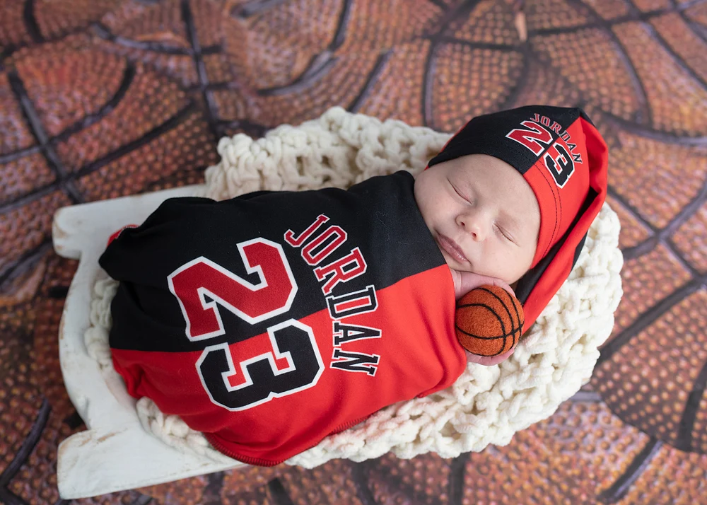 Adorable Baby in Basketball-Themed Outfit