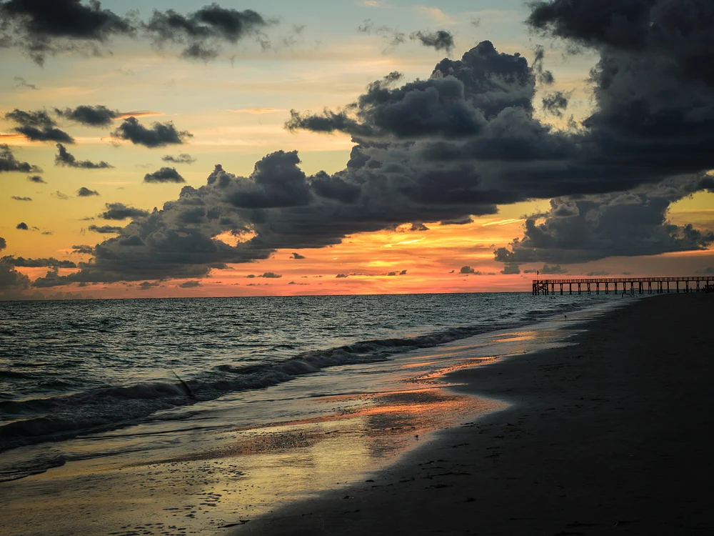 Dramatic Sunset Over Serene Beachscape