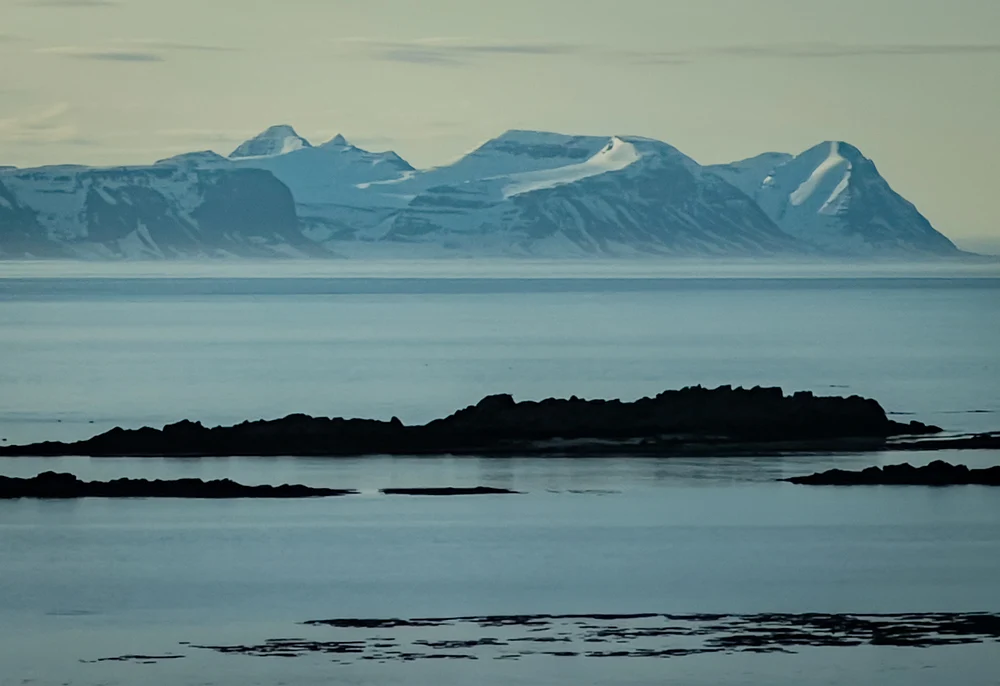 Serene Westfjords Landscape with Snow-Capped Peaks