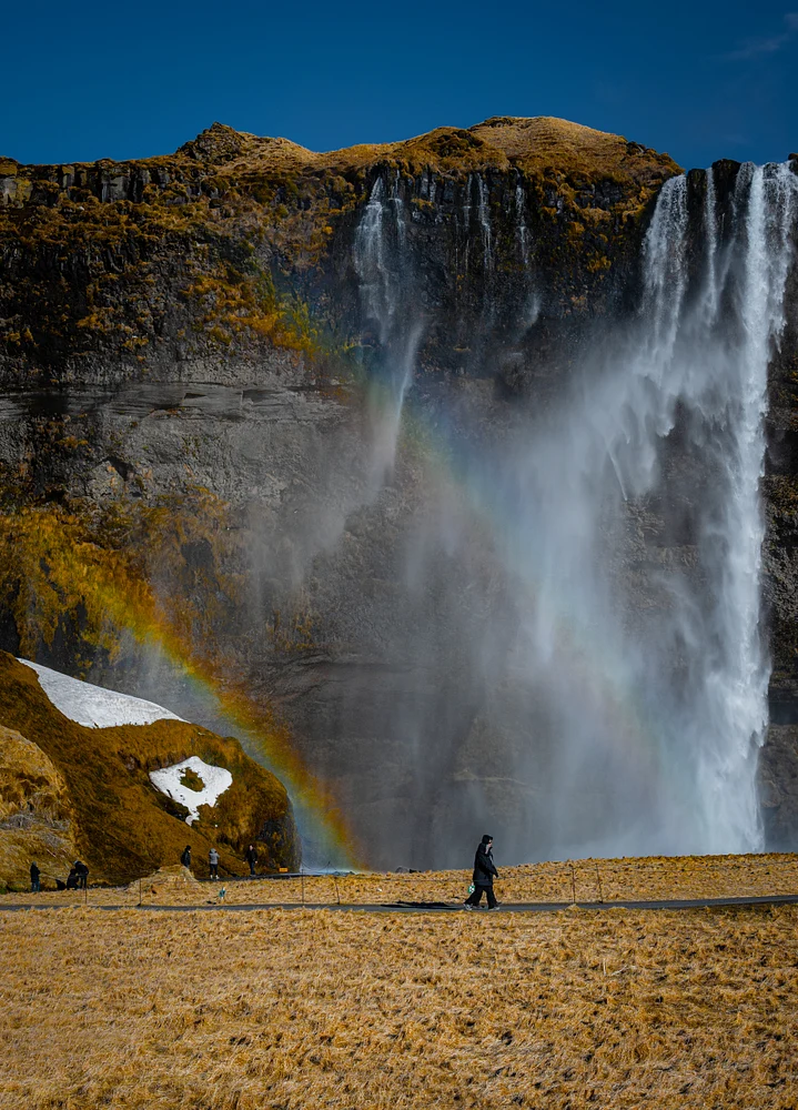 Majestic Seljalandsfoss Waterfall with Rainbow