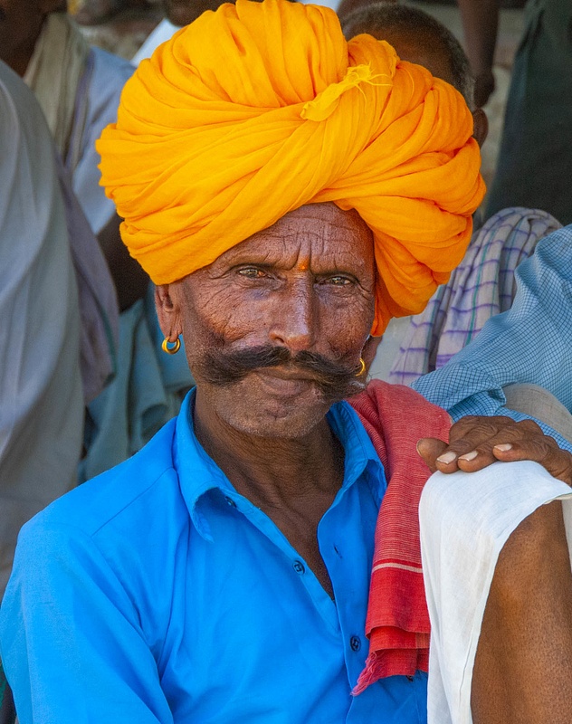 Man with a bright turban and an interesting face in Rajasthan, India