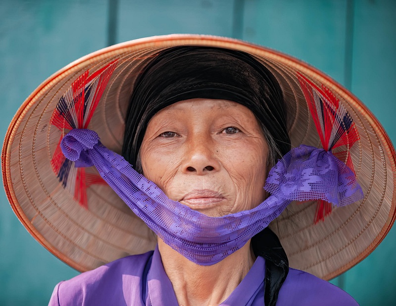 Portrait of a woman on a house boat, Ha Long Bay, Vietnam