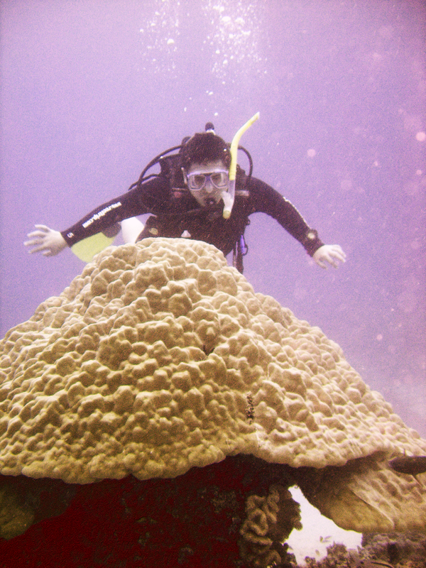Ben checking out the top of a coral head