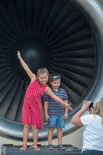 Julia and Weston in front of the Fed Ex A300 engine by...