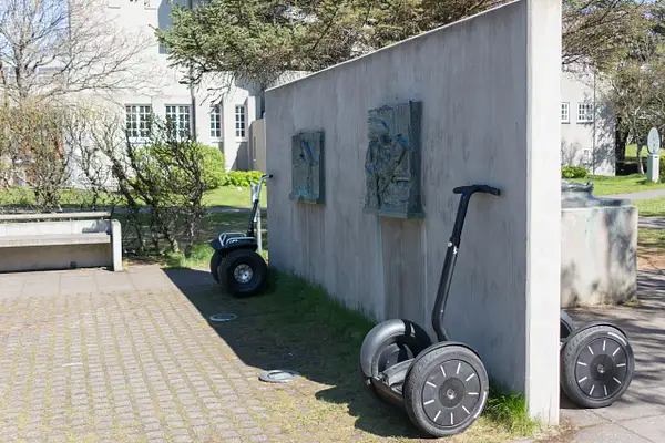 The Segways are helping hold up the wall by Willis Chung