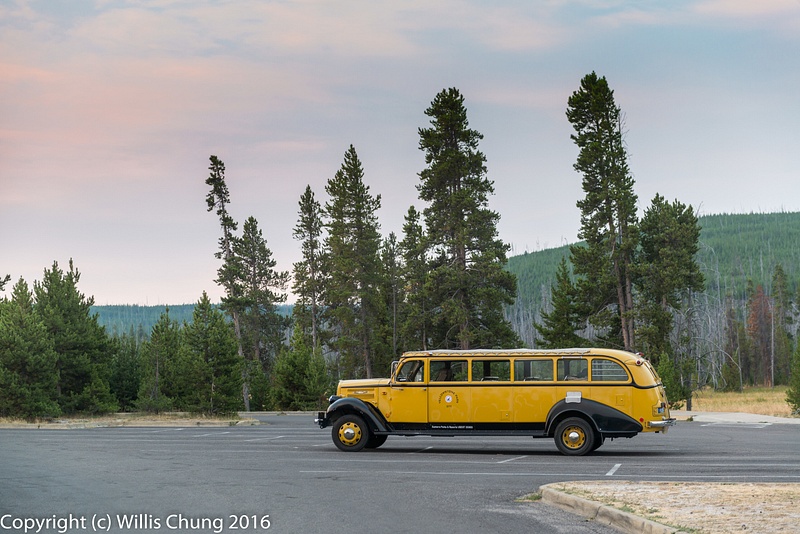 Our yellow bus sits quietly as the sun starts to come over the ridge.
