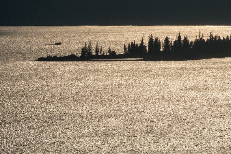 Cruise boat returning at sunset, Yellowstone Lake from Lake Butte Overlook