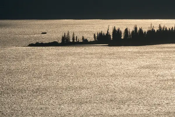 Cruise boat returning at sunset, Yellowstone Lake from...