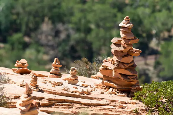 Cairns at the summit of Angels Landing. by Willis Chung