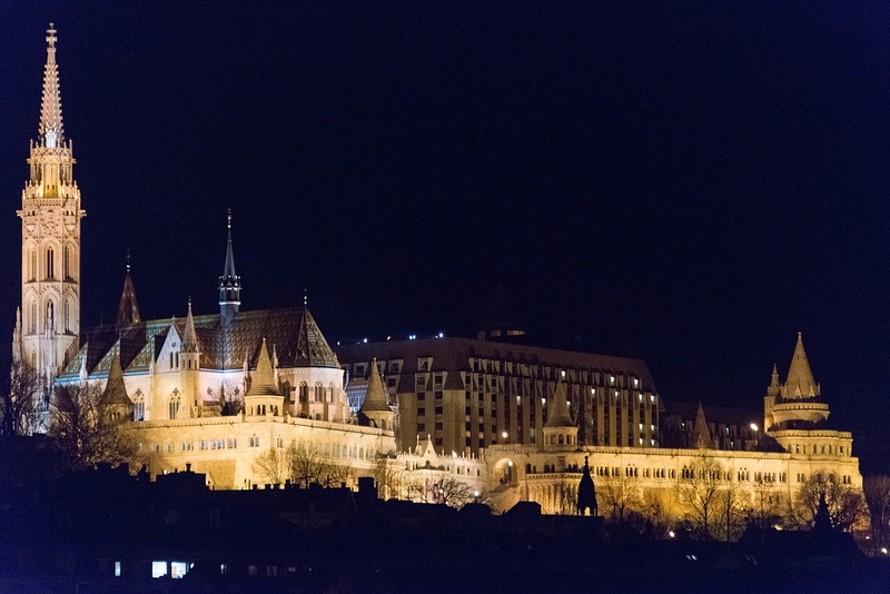 Matthias Church, Fisherman's Bastion, and the Hilton Budapest on the hill overlooking the Danube.