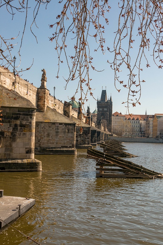 Wooden barriers protecting the piers of the Charles Bridge, Prague, Czechia