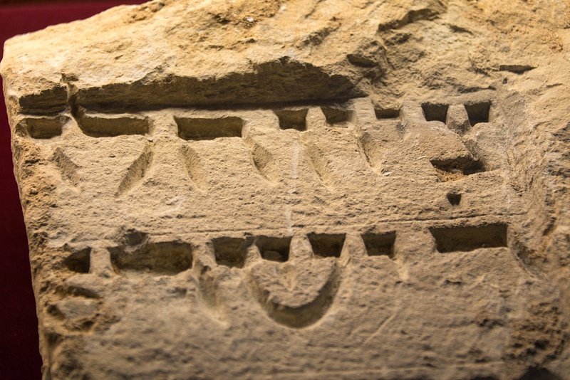 Carved Hebrew is particularly striking with regular shadows.