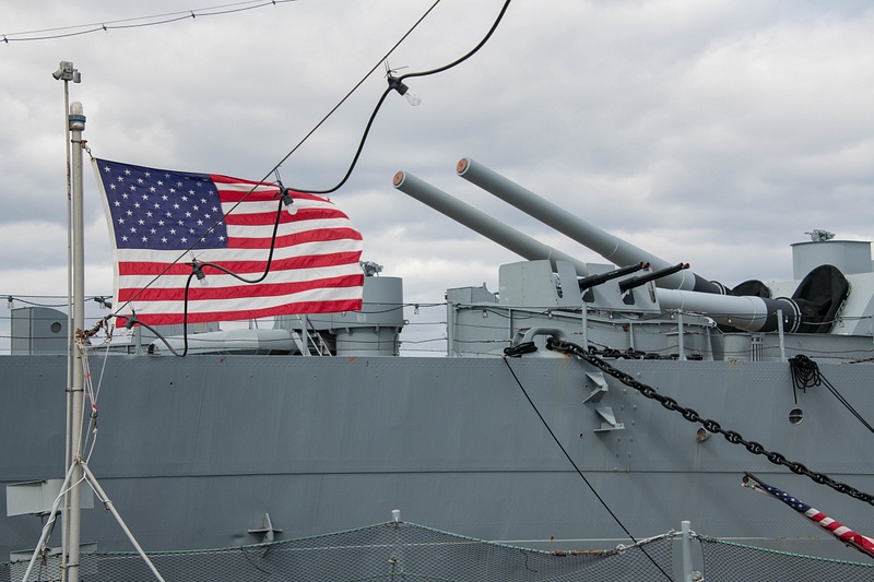 Still a nice photo with the flag on the fantail of the Joe Kennedy and the rear 16 inch guns on BB59