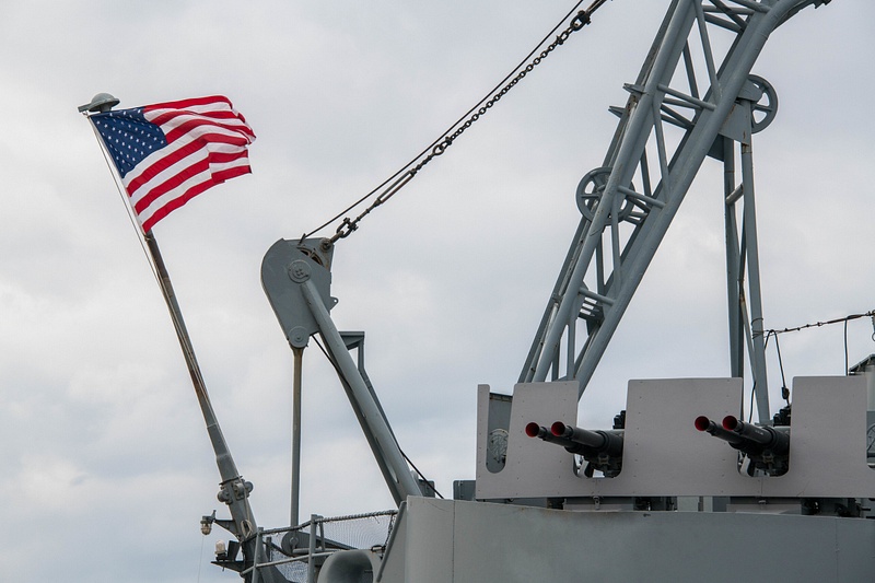 Flag and 40mm anti-aircraft batteries on the fantail of the USS Massachusetts.