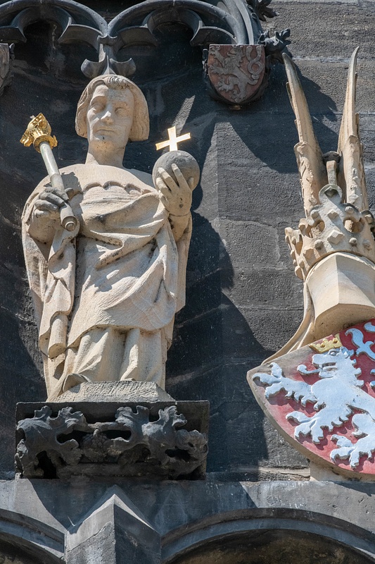 Details of the central lower statue of the Old Town Bridge Tower.  Czech lions on the crests.