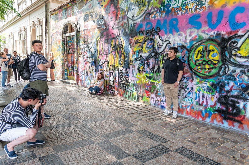 Lots of photography happening at the Lennon Wall, Praha.