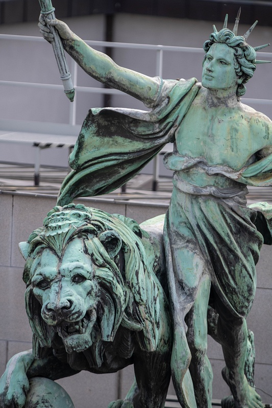 Genius and Lion Statue, atop the Czech National Bank building.