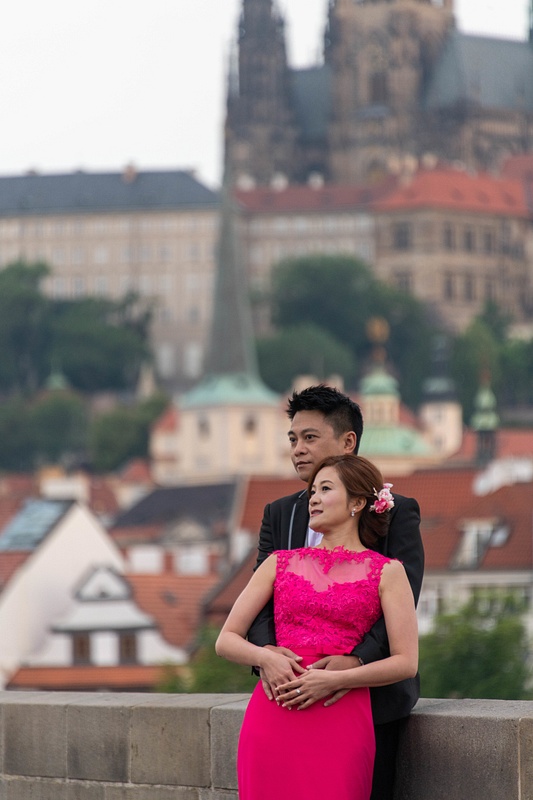 Bridal portraits being taken with St. Vitus Cathedral as a backdrop.