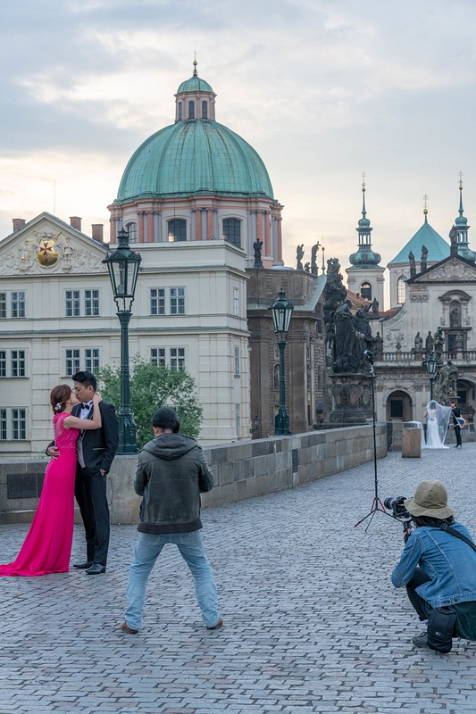 Another two bridal parties getting photos taken on the eastern side of the Charles Bridge.