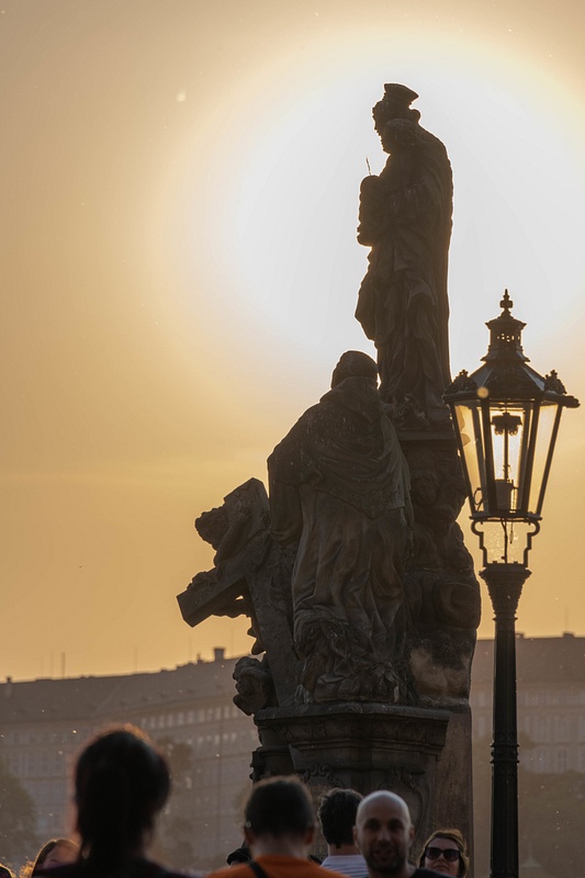 Statue pf Madonna and St. Bernard on the Charles Bridge, Praha in the late afternoon