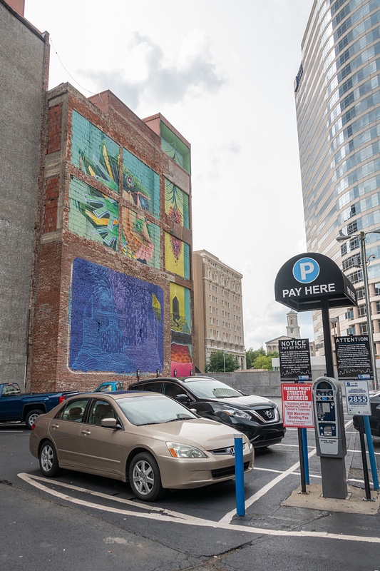 The mural further back: Downtown Presbyterian duo of murals, artist Tavar Zawacki