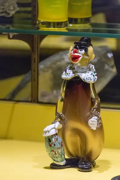 Another of the glass clowns on the bar. by Willis Chung