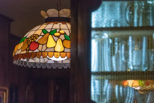 The middle Tiffany style lamp in the kitchen, the far...