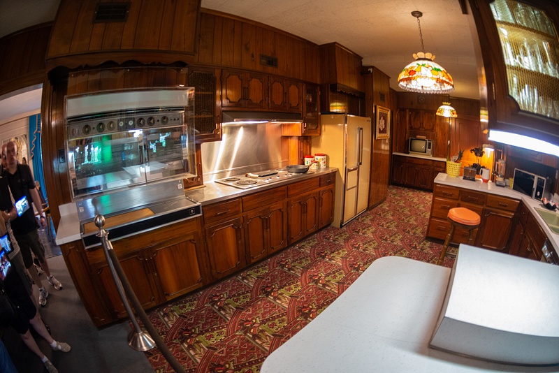 Here's the kitchen at Graceland. A complicated microwave oven is behind the glass.