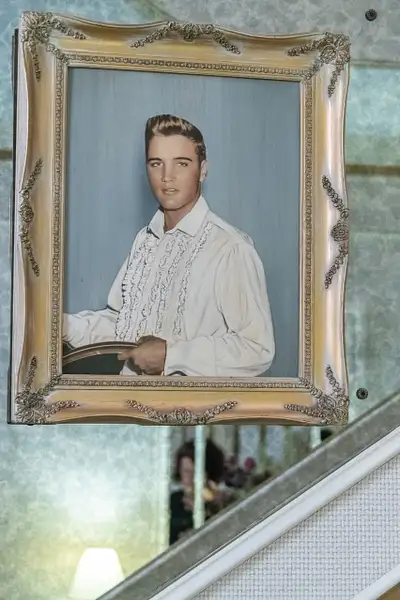 Elvis portrait on the wall of the main staircase. by...